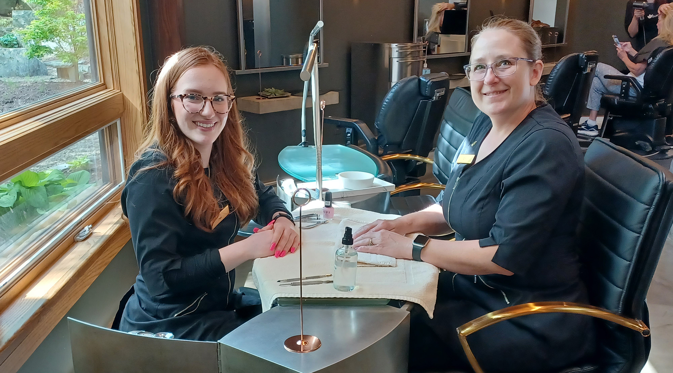 Salon workers smile for the camera